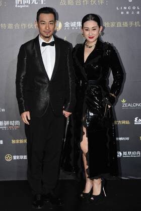 BEIJING, CHINA - DECEMBER 07: Actor Vincent Zhao Wenzhuo and wife Zhang Danlu pose on the red carpet of the 13th Man At His Best Award at the Worker s Stadium on December 7, 2016 in Beijing, China.  CFP496717262