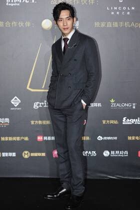 BEIJING, CHINA - DECEMBER 07: Actor Jing Boran poses on the red carpet of the 13th Man At His Best Award at the Worker s Stadium on December 7, 2016 in Beijing, China.  CFP496717279