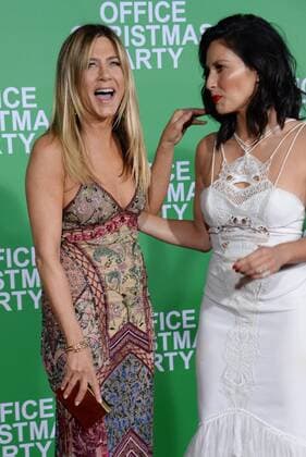 Cast members Jennifer Aniston and Olivia Munn attend the premiere of the motion picture comedy Office Christmas Party at the Regency Village Theater in the Westwood section of Los Angeles on December 7, 2016. Storyline: When the CEO tries to close her hard-partying brother s branch, he and his Chief Technical Officer must rally their co-workers and host an epic office Christmas party in an effort to impress a potential client and close a sale that will save their jobs.  LAP2016120767 JIMxRUYMEN