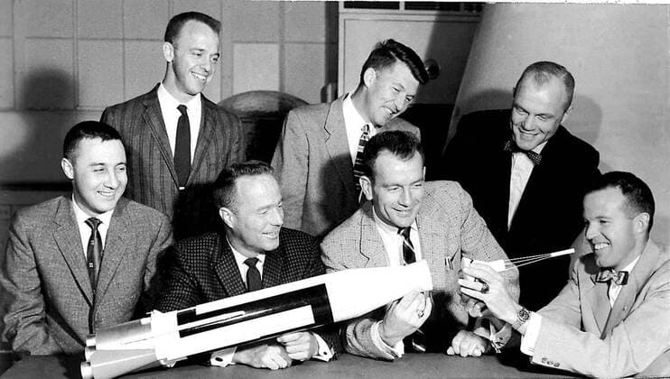 April 30, 1959 - Langley, Virginia, United States of America - The Original 7 Mercury Astronauts are pictured around a table admiring an Atlas model on April 30, 1959. Standing, left to right are Alan B. Shepard, Jr., Walter M. Schirra, Jr., and John H. Glenn, Jr.; sitting, left to right are Virgil I. Grissom, M. Scott Carpenter, Donald Slayton, and L. Gordon Cooper, Jr. .Credit: NASA via CNP Langley United States of America - ZUMAs152 19590430_zaa_s152_001