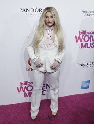 Kesha arrives on the red carpet at the Billboard Women in Music 2016 event on December 9, 2016 in New York City.  NYP20161209122 JOHNxANGELILLO