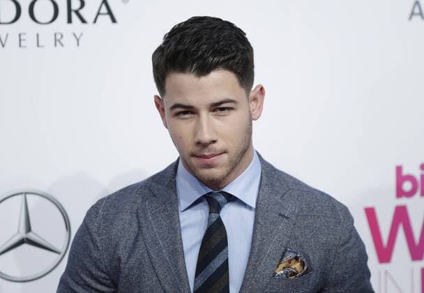 Nick Jonas arrives on the red carpet at the Billboard Women in Music 2016 event on December 9, 2016 in New York City.  NYP20161209128 JOHNxANGELILLO