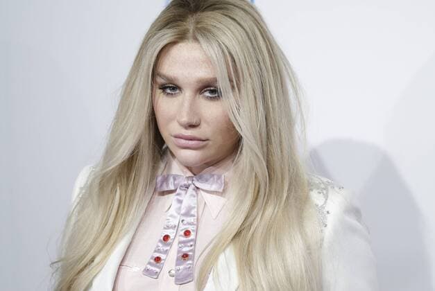 Kesha arrives on the red carpet at the Billboard Women in Music 2016 event on December 9, 2016 in New York City.  NYP20161209125 JOHNxANGELILLO