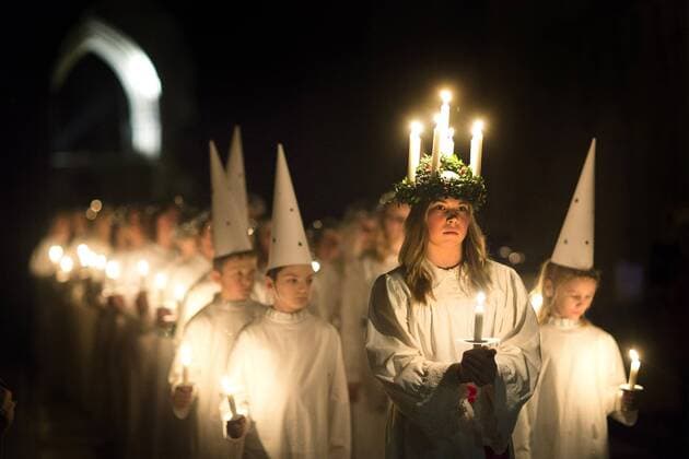 December 9, 2016 - York, Yorkshire, UK - York UK. 15 year old Matilda Jarl from Stockholm leads the Sankta Lucia festival of Lights procession at York Minster last night (friday 09th Dec) In Sweden, Lucia is one of the most significant traditions in the calendar, a powerful symbol and celebration of light and an integral part of the Advent season. The celebration of Sankta Lucia is based on the bravery and martyrdom of a young Sicilian girl - St Lucy who died in the early fourth century. Her name and story reached Sweden along with Christianity, and she remained popular even after the Reformation as the bringer of light during the long darkness of winter. York UK  - ZUMAl94_ 20161209_zaf_l94_023