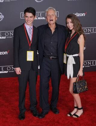 December 10, 2016 - Hollywood, CA, United States - 10 December 2016 - Hollywood, California - Dylan Michael Douglas, Michael Douglas, Carys Zeta-Douglas. Rogue One: A Star Wars Story World premiere held at Pantages Theater. Photo Credit: AdMedia Hollywood United States - ZUMAa123 20161210_zaa_a123_087