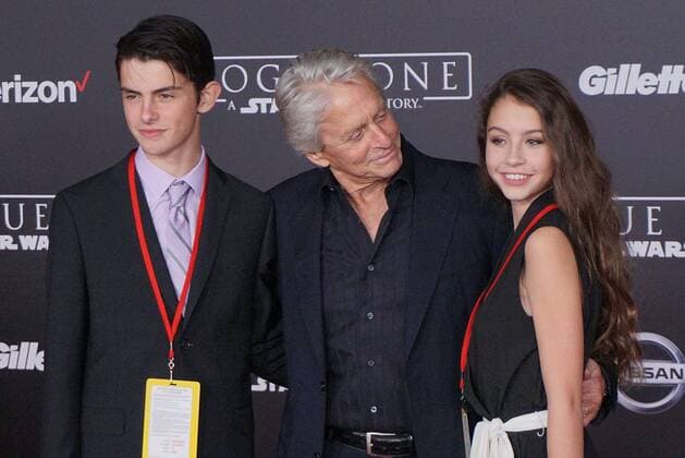 December 10, 2016 - Hollywood, CA, United States - 10 December 2016 - Hollywood, California - Dylan Michael Douglas, Michael Douglas, Carys Zeta-Douglas. Rogue One: A Star Wars Story World premiere held at Pantages Theater. Photo Credit: AdMedia Hollywood United States - ZUMAa123 20161210_zaa_a123_121