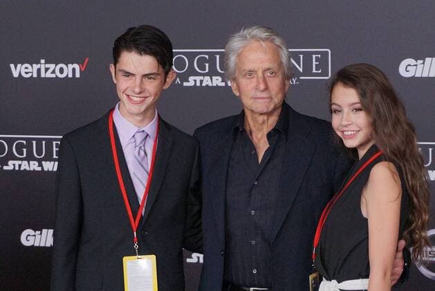 December 10, 2016 - Hollywood, CA, United States - 10 December 2016 - Hollywood, California - Dylan Michael Douglas, Michael Douglas, Carys Zeta-Douglas. Rogue One: A Star Wars Story World premiere held at Pantages Theater. Photo Credit: AdMedia Hollywood United States - ZUMAa123 20161210_zaa_a123_140