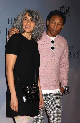 December 10, 2016 - New York, New York, U.S. - Singer PHARRELL WILLIAMS and MIMI VALDES attend the New York Special Screening of Hidden Figures held at the SVA Theatre. New York U.S. - ZUMAk03_ 20161210_zaf_k03_133