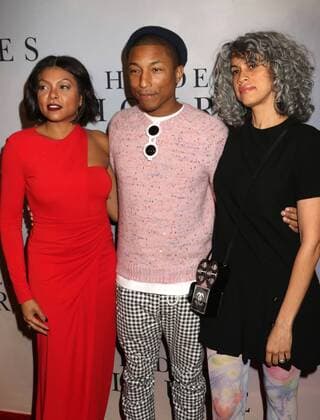 December 10, 2016 - New York, New York, U.S. - Actress TARAJI P. HENSON, singer PHARRELL WILLIAMS and MIMI VALDES attend the New York Special Screening of Hidden Figures held at the SVA Theatre. New York U.S. - ZUMAk03_ 20161210_zaf_k03_144