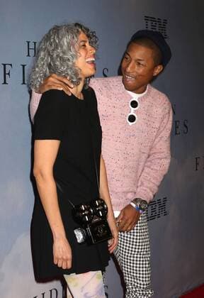 December 10, 2016 - New York, New York, U.S. - Singer PHARRELL WILLIAMS and MIMI VALDES attend the New York Special Screening of Hidden Figures held at the SVA Theatre. New York U.S. - ZUMAk03_ 20161210_zaf_k03_146