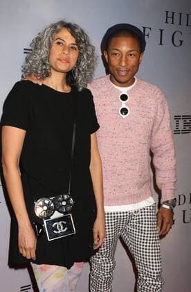 December 10, 2016 - New York, New York, U.S. - Singer PHARRELL WILLIAMS and MIMI VALDES attend the New York Special Screening of Hidden Figures held at the SVA Theatre. New York U.S. - ZUMAk03_ 20161210_zaf_k03_165