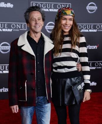 Producer Brian Grazer (L) and his wife Veronica Smiley attend the premiere of the sci-fi motion picture Rogue One: A Star Wars Story at the Pantages Theatre in the Hollywood section of Los Angeles on December 10, 2016. Storyline: The Rebellion makes a risky move to steal the plans to the Death Star, setting up the epic saga to follow.  LAP2016121069 JIMxRUYMEN