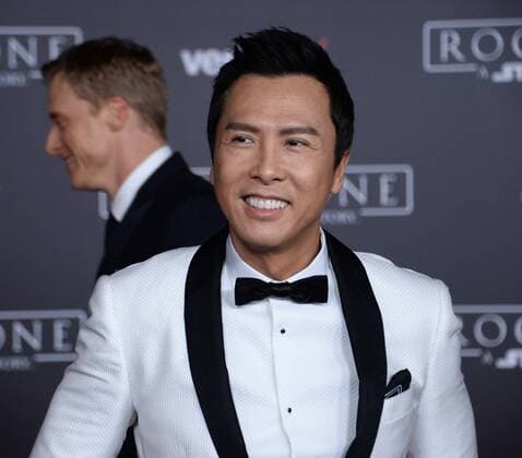 Cast members Alan Tudyk (L) and Donnie Yen attend the premiere of the sci-fi motion picture Rogue One: A Star Wars Story at the Pantages Theatre in the Hollywood section of Los Angeles on December 10, 2016. Storyline: The Rebellion makes a risky move to steal the plans to the Death Star, setting up the epic saga to follow.  LAP2016121030 JIMxRUYMEN