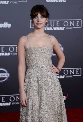 Cast member Felicity Jones attends the premiere of the sci-fi motion picture Rogue One: A Star Wars Story at the Pantages Theatre in the Hollywood section of Los Angeles on December 10, 2016. Storyline: The Rebellion makes a risky move to steal the plans to the Death Star, setting up the epic saga to follow.  LAP2016121002 JIMxRUYMEN