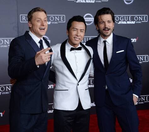 Cast members Alan Tudyk, Donnie Yen and Diego Luna (L-R) attend the premiere of the sci-fi motion picture Rogue One: A Star Wars Story at the Pantages Theatre in the Hollywood section of Los Angeles on December 10, 2016. Storyline: The Rebellion makes a risky move to steal the plans to the Death Star, setting up the epic saga to follow.  LAP2016121011 JIMxRUYMEN