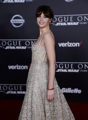 Cast member Felicity Jones attends the premiere of the sci-fi motion picture Rogue One: A Star Wars Story at the Pantages Theatre in the Hollywood section of Los Angeles on December 10, 2016. Storyline: The Rebellion makes a risky move to steal the plans to the Death Star, setting up the epic saga to follow.  LAP2016121036 JIMxRUYMEN