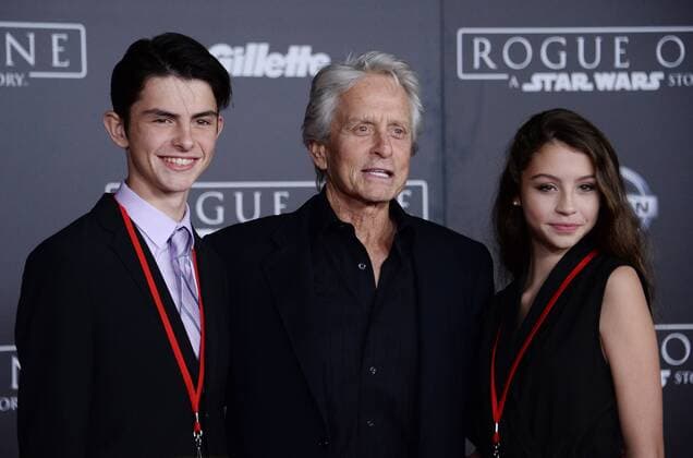 Actor Michael Douglas (C) and his son Dylan Michael Douglas (L) and daughter Carys Zeta Douglas attend the premiere of the sci-fi motion picture Rogue One: A Star Wars Story at the Pantages Theatre in the Hollywood section of Los Angeles on December 10, 2016. Storyline: The Rebellion makes a risky move to steal the plans to the Death Star, setting up the epic saga to follow.  LAP2016121065 JIMxRUYMEN