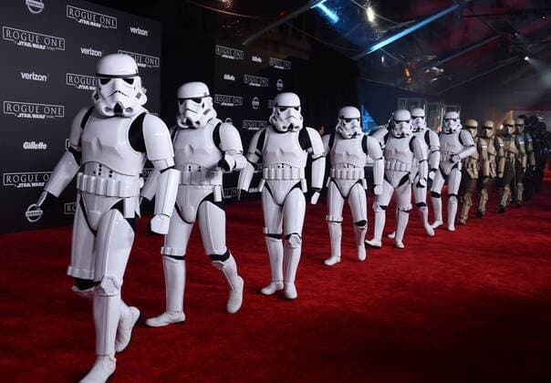Storm troopers walk the red carpet during the premiere of the sci-fi motion picture Rogue One: A Star Wars Story at the Pantages Theatre in the Hollywood section of Los Angeles on December 10, 2016. Storyline: The Rebellion makes a risky move to steal the plans to the Death Star, setting up the epic saga to follow.  LAP2016121081 JIMxRUYMEN