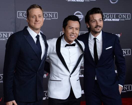 Cast members Alan Tudyk, Donnie Yen and Diego Luna (L-R) attend the premiere of the sci-fi motion picture Rogue One: A Star Wars Story at the Pantages Theatre in the Hollywood section of Los Angeles on December 10, 2016. Storyline: The Rebellion makes a risky move to steal the plans to the Death Star, setting up the epic saga to follow.  LAP2016121009 JIMxRUYMEN