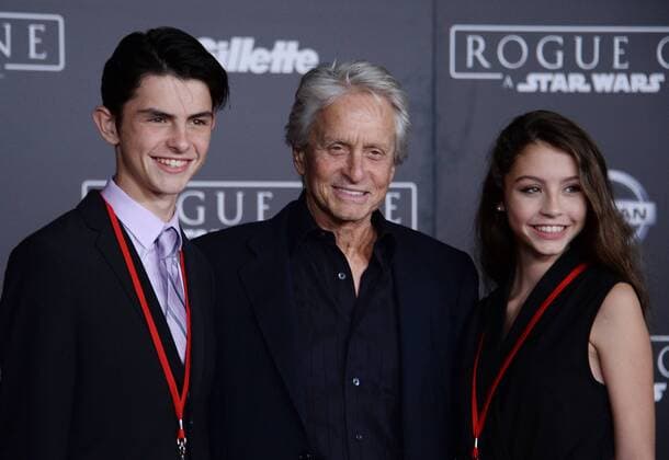 Actor Michael Douglas (C) and his son Dylan Michael Douglas (L) and daughter Carys Zeta Douglas attend the premiere of the sci-fi motion picture Rogue One: A Star Wars Story at the Pantages Theatre in the Hollywood section of Los Angeles on December 10, 2016. Storyline: The Rebellion makes a risky move to steal the plans to the Death Star, setting up the epic saga to follow.  LAP2016121064 JIMxRUYMEN