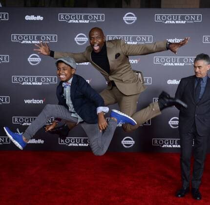 Actor Terry Crews and his son Isaiah Crews attend the premiere of the sci-fi motion picture Rogue One: A Star Wars Story at the Pantages Theatre in the Hollywood section of Los Angeles on December 10, 2016. Storyline: The Rebellion makes a risky move to steal the plans to the Death Star, setting up the epic saga to follow.  LAP2016121071 JIMxRUYMEN
