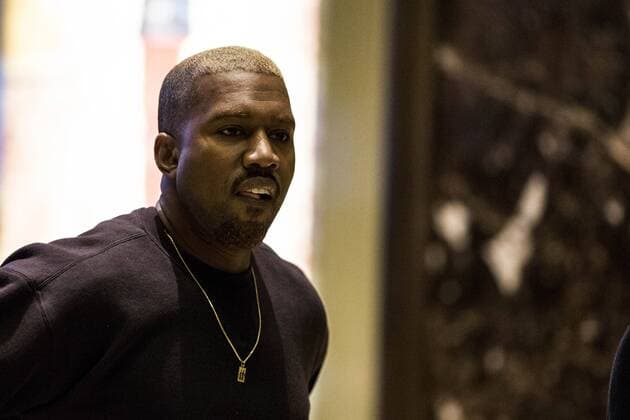Musician Kanye West arrives at Trump Tower in New York City on December 13, 2016. President-elect Donald Trump is holding a series of meetings. Pool photo by John Taggart  WAX20161213203 JOHNxTAGGART