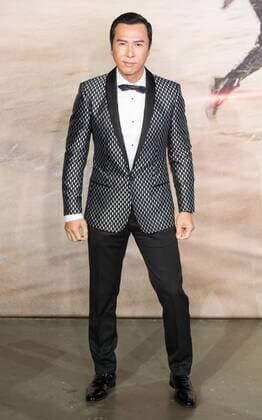 December 13, 2016 - London, London, UK - DONNIE YEN attends the launch of Rogue One: A Star Wars Story. The film follows a group of unlikely heroes banding together on a mission to steal the plans to the Death Star, the Empire s ultimate weapon of destruction. This key event in the Star Wars timeline brings together ordinary people who choose to do extraordinary things, and in doing so, become part of something greater than themselves. London, UK. London UK  - ZUMAl94_ 20161213_zaf_l94_053