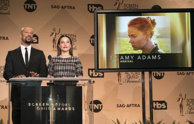 December 14, 2016 - West Hollywood, California, U.S - Common and Sophia Bush at the 23rd Annual Screen Actors Guild Awards Nominations announcement at the Pacific Design Center on Wednesday, December 14, 2016 in West Hollywood, California. Outstanding Performance by a Female Actor in a Leading Role, AMY ADAMS Louise Banks Ã¢â‚¬ ARRIVALÃ West Hollywood U.S. - ZUMAp124 20161214_zaa_p124_032