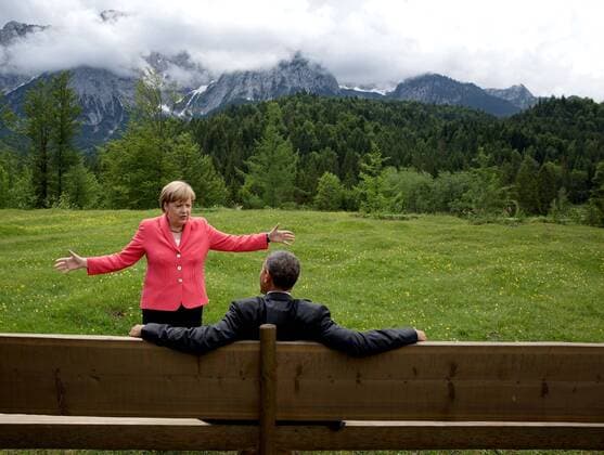 June 8, 2015 - Krun, Germany - U.S. President Barack Obama speaks with Chancellor Angela Merkel before a group photo at the G7 Summit June 8, 2015 in KrÅ¸n, Germany. . Barack Hussein Obama II (born August 4, 1961) is the 44th President of the United States. He is the first African American to be elected to office and the first president born outside the contiguous United States. Born in Honolulu, Hawaii, Obama is a graduate of Columbia University and Harvard Law School. He worked as a civil rights attorney and taught constitutional law at the University of Chicago Law School from 1992 to 2004. While serving three terms representing the 13th District in the Illinois Senate from 1997 to 2004, he ran unsuccessfully in the Democratic primary for the United States House of Representatives in 2000. Krun Germany - ZUMAz03_ 20150608_shx_z03_530