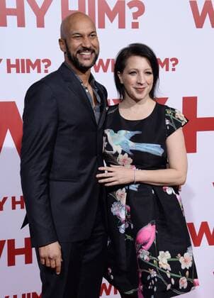 Actor Keegan-Michael Key (L) and film producer Elisa Pugliese attend the premiere of the motion picture comedy Why Him? at the Regency Bruin Theater in the Westwood section of Los Angeles on December 17, 2016. Storyline: A dad forms a bitter rivalry with his daughter s young rich boyfriend.  LAP2016121720 JIMxRUYMEN
