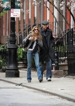 EXCLUSIVE TO Sharkpixs PICTURES - PLEASE CALL FOR RATES April 13 2008, New York City Supermodel Gisele Bundchen and New England Patriots quarterback Tom Brady look glum as they leave her West Village townhouse. As they spot our photographer, Gisele reaches for Tom s hand and holds it until she realises that she has left her belt half undone. They pause briefly to allow her to do it up and then disappear downtown in a cab  - ZUMAny1_ 20080413_zaf_ny7_009