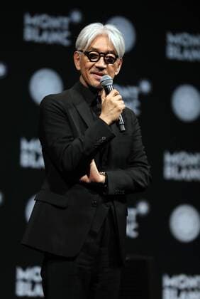 December 21, 2016, Tokyo, Japan - Japanese composer Ryuichi Sakamoto, a member of the Yellow Magic Orchestra (YMO) speaks after he received Montblanc de la Culture Arts Patronage Award in Tokyo on Wednesday, December 21, 2016. Sakamoto played his screen music Merry Christmas Mr. Lawrence with young musicians.  (lwxa006992)