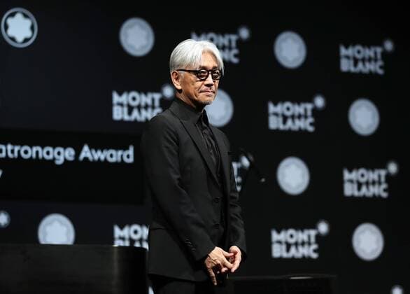 December 21, 2016, Tokyo, Japan - Japanese composer Ryuichi Sakamoto, a member of the Yellow Magic Orchestra (YMO) speaks after he received Montblanc de la Culture Arts Patronage Award in Tokyo on Wednesday, December 21, 2016. Sakamoto played his screen music Merry Christmas Mr. Lawrence with young musicians.  (lwxa006993)