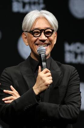 December 21, 2016, Tokyo, Japan - Japanese composer Ryuichi Sakamoto, a member of the Yellow Magic Orchestra (YMO) speaks after he received Montblanc de la Culture Arts Patronage Award in Tokyo on Wednesday, December 21, 2016. Sakamoto played his screen music Merry Christmas Mr. Lawrence with young musicians.  (lwxa006995)