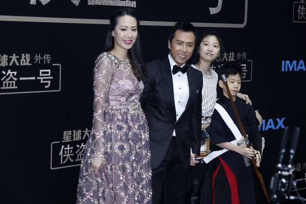 BEIJING, CHINA - DECEMBER 21: (L-R) Actor Donnie Yen s wife model Cecilia Wang, actor Donnie Yen, Donnie Yen s daughter Jasmine Yen and his son James Yen arrive at the red carpet of the premiere of film Rogue One: A Star Wars Story on December 21, 2016 in Beijing, China.  CFP497374465