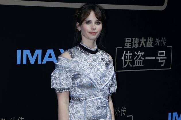 BEIJING, CHINA - DECEMBER 21: English actress Felicity Jones arrives at the red carpet of the premiere of film Rogue One: A Star Wars Story on December 21, 2016 in Beijing, China.  CFP497374473