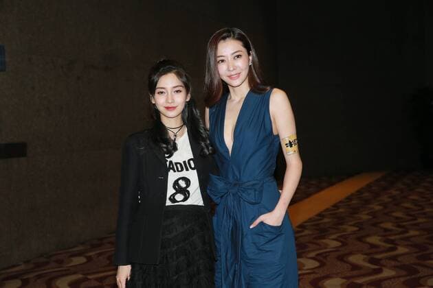 HONG KONG, CHINA - DECEMBER 22: Actress Lynn Hung (aka Xiong Dailin) (R) and actress Angelababy in pregnancy attend the charity premiere of director Zhang Jiajia s film See You Tomorrow on December 22, 2016 in Hong Kong, China.  CFP497405346