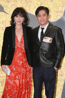 HONG KONG, CHINA - DECEMBER 22: Actor Tony Leung Chiu Wai and his wife actress Carina Lau attend the charity premiere of director Zhang Jiajia s film See You Tomorrow on December 22, 2016 in Hong Kong, China.  CFP497405348