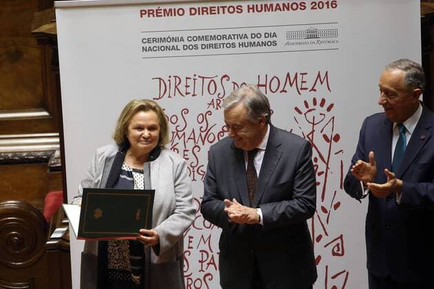 December 23, 2016 - Lisbon, Portugal - Newly sworn-in Secretary General of the United Nations Antonio Guterres (C ) passes on his human rights award to Refugees Portuguese Council President Teresa Tito de Morais (L) during a ceremony at the Parliament in Lisbon, Portugal, on December 23 2016. This year s award was given to Antonio Guterres, Secretary-General of the United Nations, for his work in the defense of human rights, especially in the discharge of the duties of United Nations High Commissioner for Refugees (UNHCR). This Prize is awarded annually by the President of the Assembly of the Republic, after hearing the Conference of Leaders, on the proposal of the jury constituted by the Committee on Constitutional Affairs, Rights, Freedoms and Guarantees. Photo: . Lisbon Portugal - ZUMAf123 26649058sp
