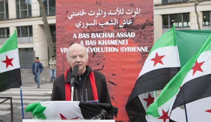 December 24, 2016 - Paris, France - Former French bishop Jacques Gaillot delivers a speech during a demonstration outside the Iranian embassy in Paris on 24 December 24, 2016 in solidarity with the people of Syria and in protest against killings carried out by militia and forces affiliated with the Iranian regime in that country on Christmas eve. Paris France  - ZUMAn230 20161224_zaa_n230_205