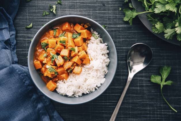 Bowl of sweetpotato ragout served with rice  IPF00346