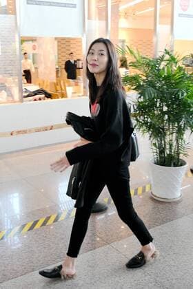 SHANGHAI, CHINA - DECEMBER 31: Fashion model Liu Wen seen at the airport on December 31, 2016 in Shanghai, China.  CFP497682815