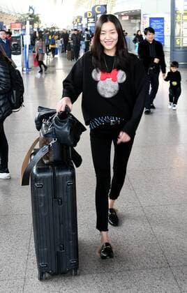 SHANGHAI, CHINA - DECEMBER 31: Fashion model Liu Wen seen at the airport on December 31, 2016 in Shanghai, China.  CFP497682821