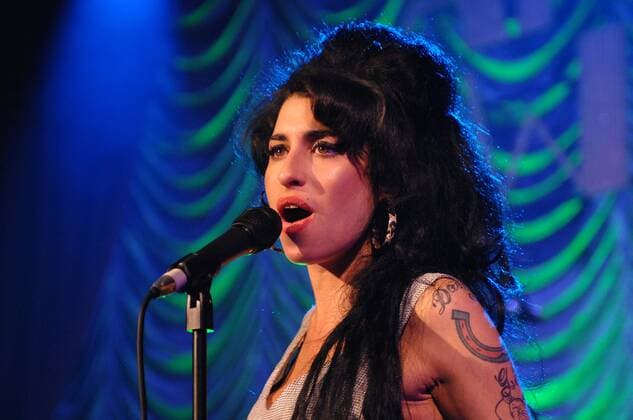 May 28, 2007 - London, England, UK - Singer AMY WINEHOUSE performing live at the Shepherds Bush Empire in West London. The gig replaced a postponed show which was cancelled at last minute as a result of Amy breaking a tooth.  - ZUMAd33_ 20070528_rnn_d33_107