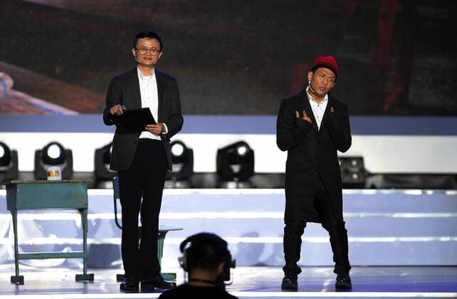 SANYA, Jan. 5, 2017 -- Jack Ma (L) performs a short play during the awarding ceremony of the Jack Ma Rural Teachers Award in Sanya, a tourism resort in south China s Hainan Province, on Jan. 5, 2017. The event was held on Thursday, with 100 rural teachers winning the award of 100,000 yuan (14,522 U.S. dollars) respectively. ) (wf) CHINA-SANYA-JACK MA-RURAL TEACHERS AWARD (CN) YangxGuanyu 