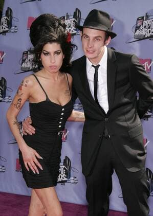 Jun 1, 2007 - Hollywood, California, USA - Singer AMY WINEHOUSE & HUSBAND at the Mtv Movie Awards held at the Gibson Ampitheater. - ZUMAo05_ 20070603_lis_o05_004