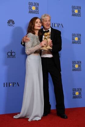 Jan 8, 2017 - Beverly Hills, California, U.S - After winning the category of BEST PERFORMANCE BY AN ACTRESS IN A MOTION PICTURE DRAMA for her role in Elle, actress ISABELLE HUPPERT poses backstage with winner for BEST FOREIGN LANGUAGE FILM director, PAUL VERHOEVEN with their awards backstage in the press room at the 74th Annual Golden Globe Awards at the Beverly Hilton in Beverly Hills, CA on Sunday, January 8, 2017. Beverly Hills U.S - ZUMAz03_ 20170108_sha_z03_558