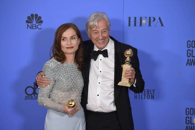 January 8, 2017 - Los Angeles, California, U.S. - ISABELLE HUPPERT and PAUL VERHOEVEN celebrate their win backstage for ELLE at the 74th Annual Golden Globe Awards, at The Beverly Hilton in Beverly Hills. Los Angeles U.S. - ZUMAz03_ 20170108_zbp_z03_429