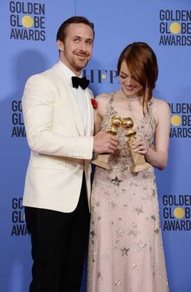 Ryan Gosling and Emma Stone, winners of the awards for Best Performance by an Actor and Actress in a Motion Picture Musical or Comedy respectively for La La Land appear backstage with their trophies during the 74th annual Golden Globe Awards at the Beverly Hilton Hotel in Beverly Hills, California on January 8, 2017.  LAP201701084016 JIMxRUYMEN