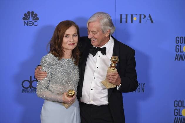 January 8, 2017 - Los Angeles, California, U.S. - ISABELLE HUPPERT and PAUL VERHOEVEN celebrate their win backstage for ELLE at the 74th Annual Golden Globe Awards, at The Beverly Hilton in Beverly Hills. Los Angeles U.S. - ZUMAz03_ 20170108_zbp_z03_428